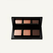 Palette de fards à paupières MisaParis, trois teintes : or rosé irisé, cuivre scintillant et brun mat, présentée dans un boîtier doré ouvert avec miroir sur fond blanc.